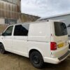 A campervan with a bonded window, just one of the types of campervan window fitting services Motorhome Workshop offers.