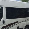 A campervan with a bonded window, just one of the types of campervan window fitting services Motorhome Workshop offers.