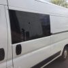 A campervan with a bonded window, just one of the types of campervan window fitting services Motorhome Workshop offers.