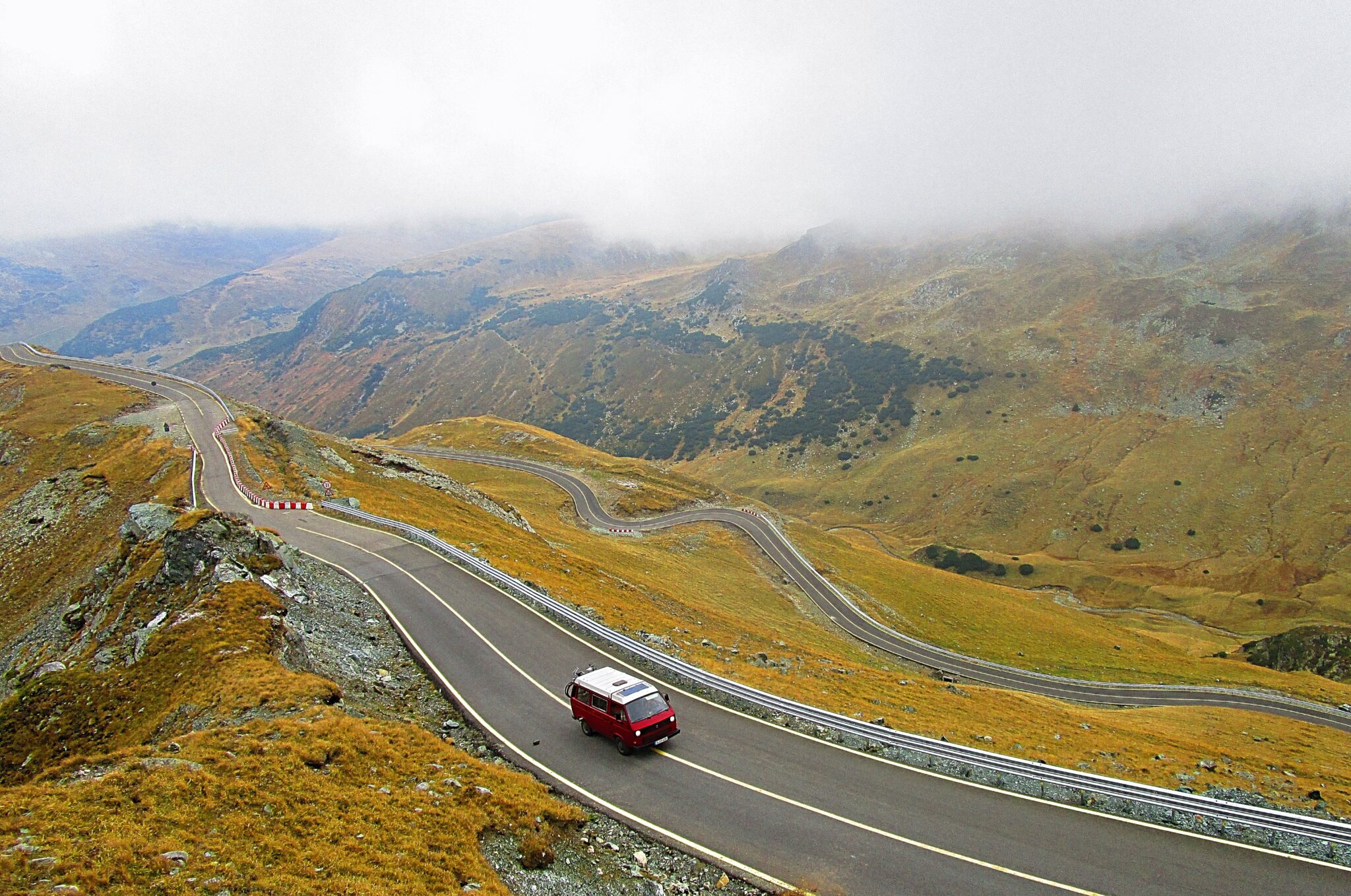 VW camper van on winding road