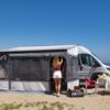 Fiamma privacy room on a van conversion on a sandy beach