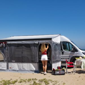 Fiamma privacy room on a van conversion on a sandy beach