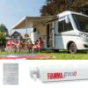 F80s 3.2m awning on motorhome, shading a family sitting around a table next to the motorhome